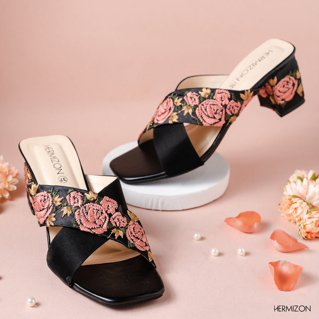 A black color shoe with rose embroidery design 