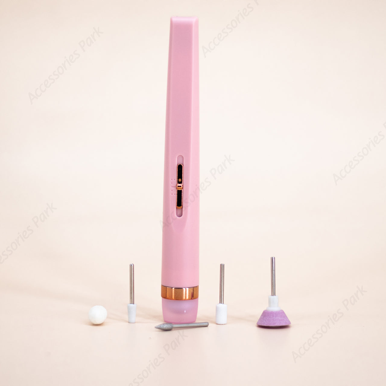 A pink color manicure device with five beads
