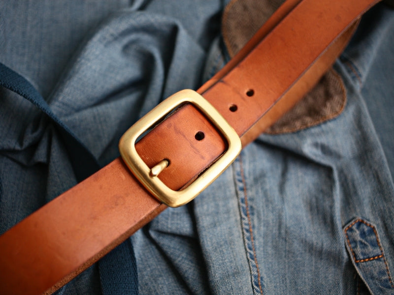 Showing a ladies belt of brown color.
