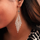 sparkle stone earrings on a girl's ear