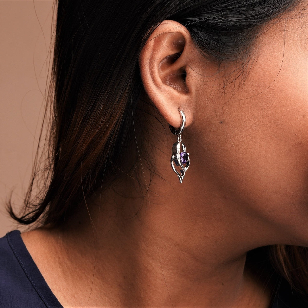 A purple color stone earrings