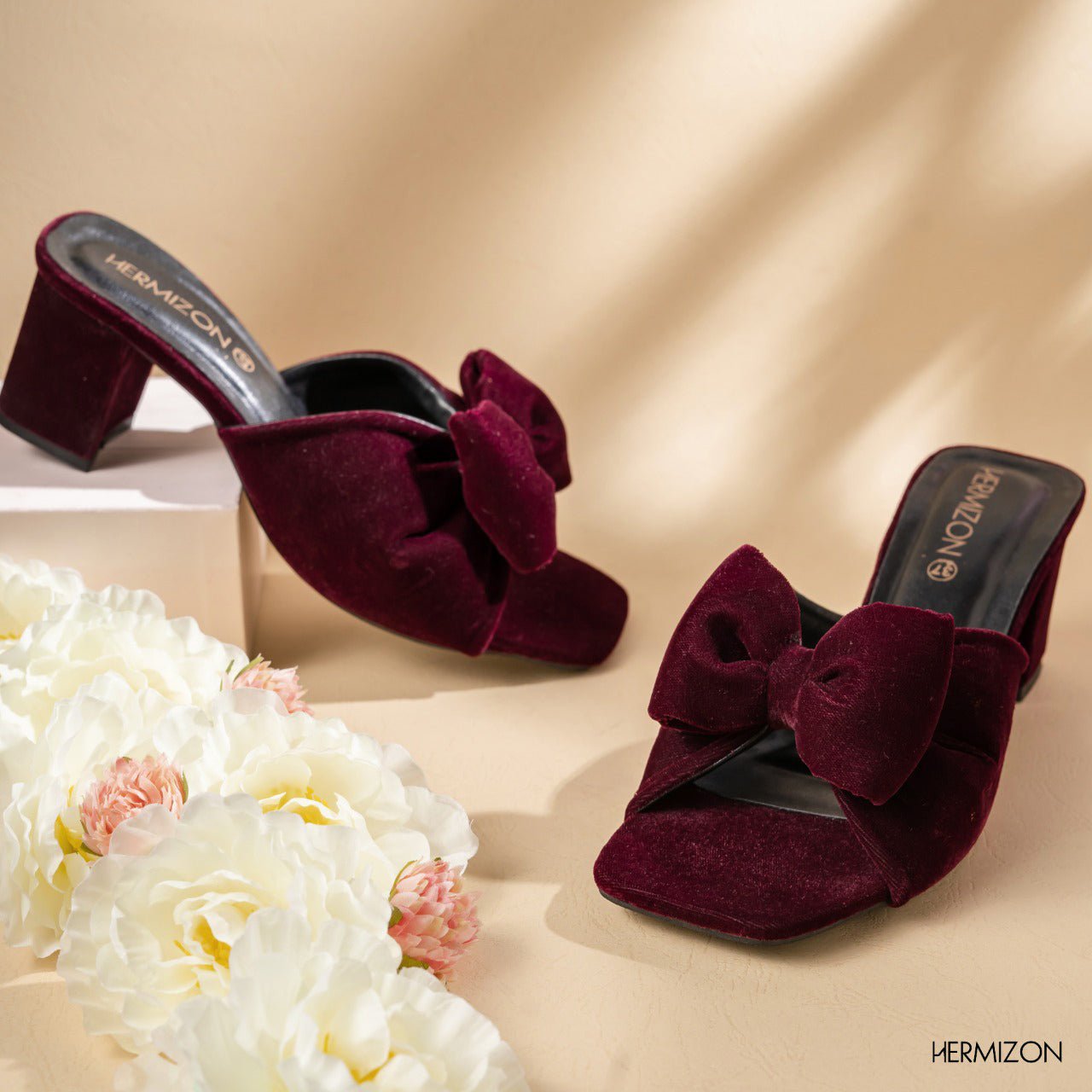 A marron color shoe from hermizon with black color sole