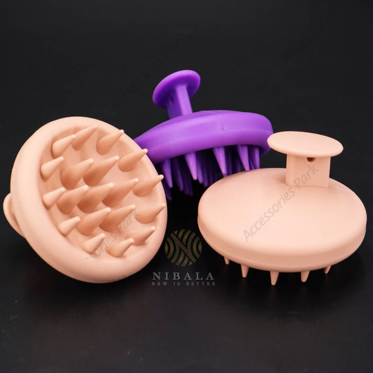 Skin and purple color scalp cleanser brush for scalp cleansing and hair care.