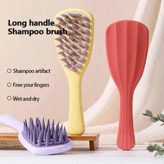 Three shampoo brushes with different designs on a neutral background