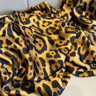 Leopard print fabric on a white background