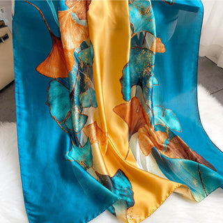 Colorful scarf with floral pattern on a white surface