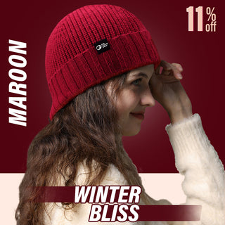 Person wearing a red knit hat with a brand logo on a maroon background, promoting 'Winter Bliss' with an 11% discount.