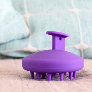a purple color scalp cleansing brush